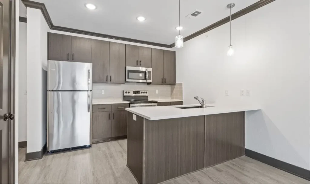 kitchen modern appliances hard floors parkville flats apartments